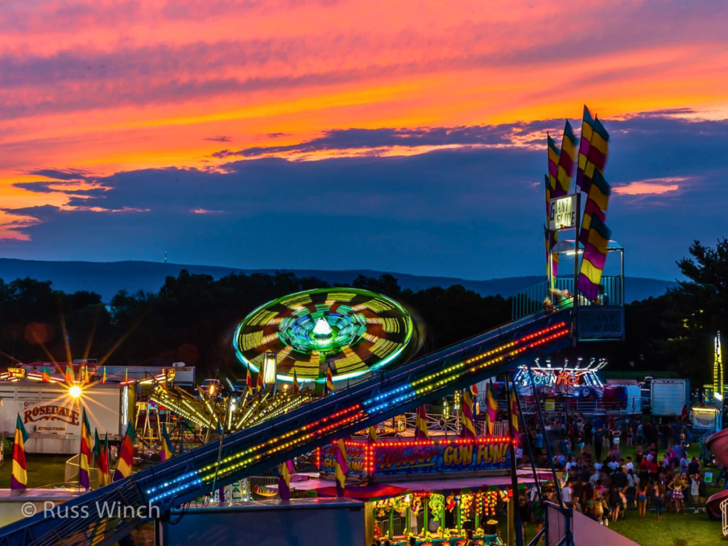 Crowds enjoying a summer carnival and festival in Frederick County, Maryland