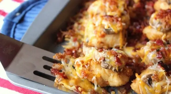 Lift up your nuggets off of the cookie sheet with a cookie turner