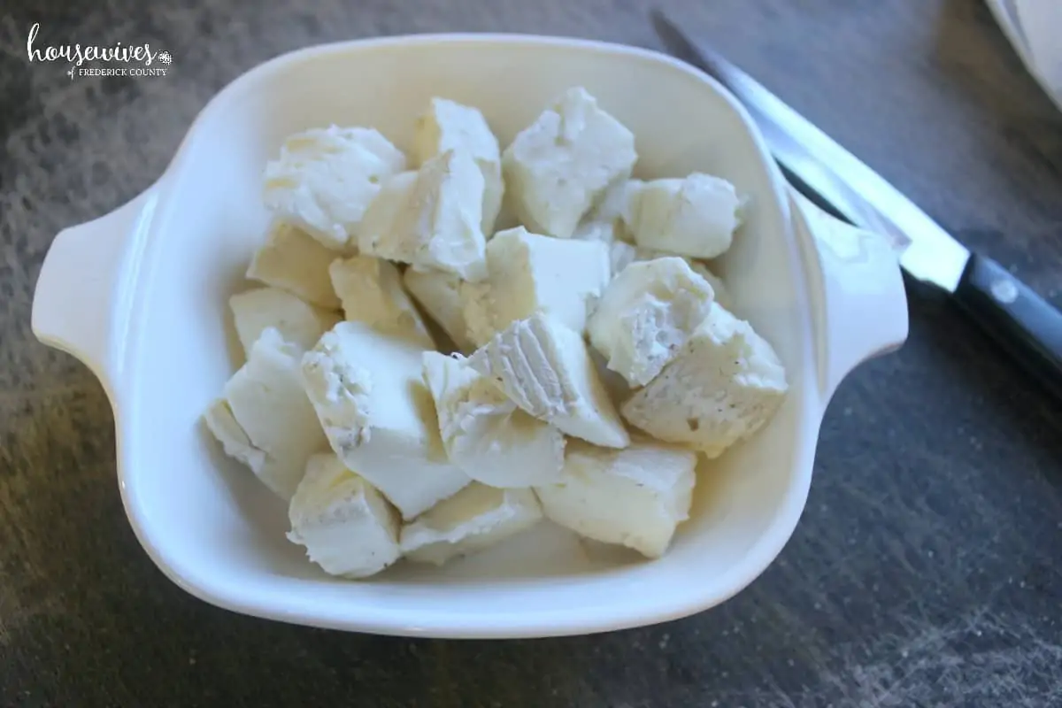 Cut brie cheese into 1 inch pieces