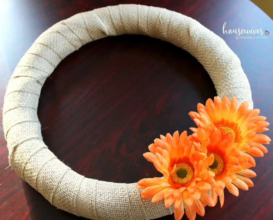 Flowers hot glued on your front door wreath