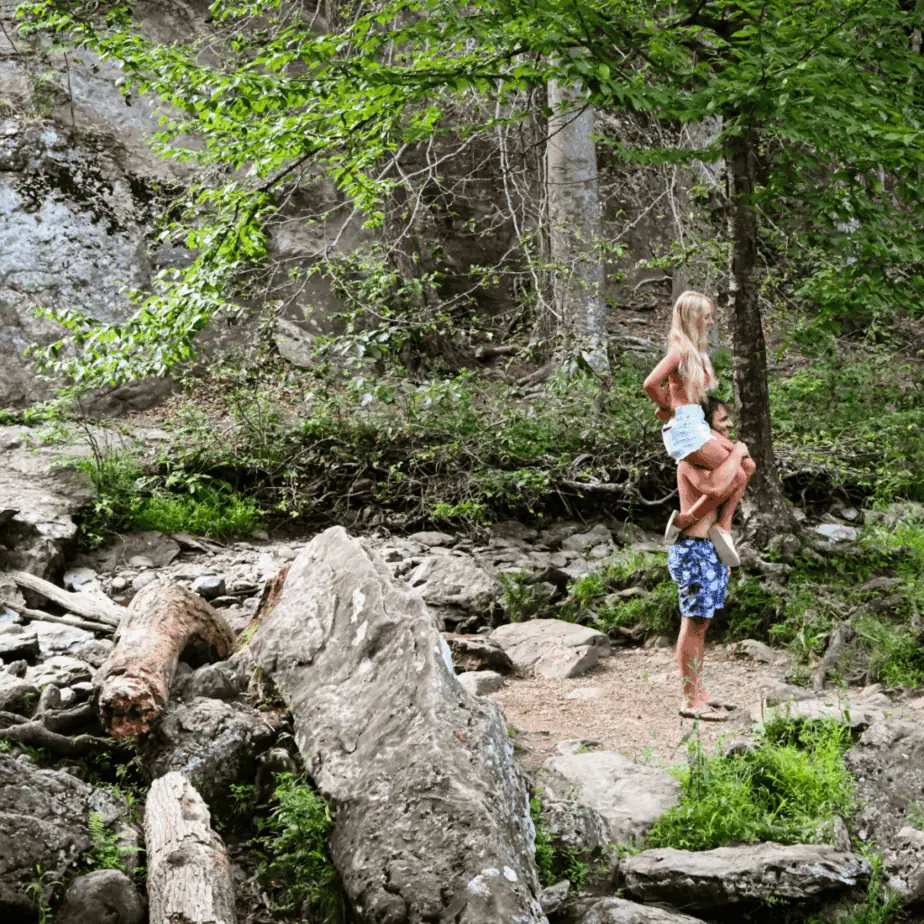 Couple hiking Cunningham Falls on a Frederick MD date adventure