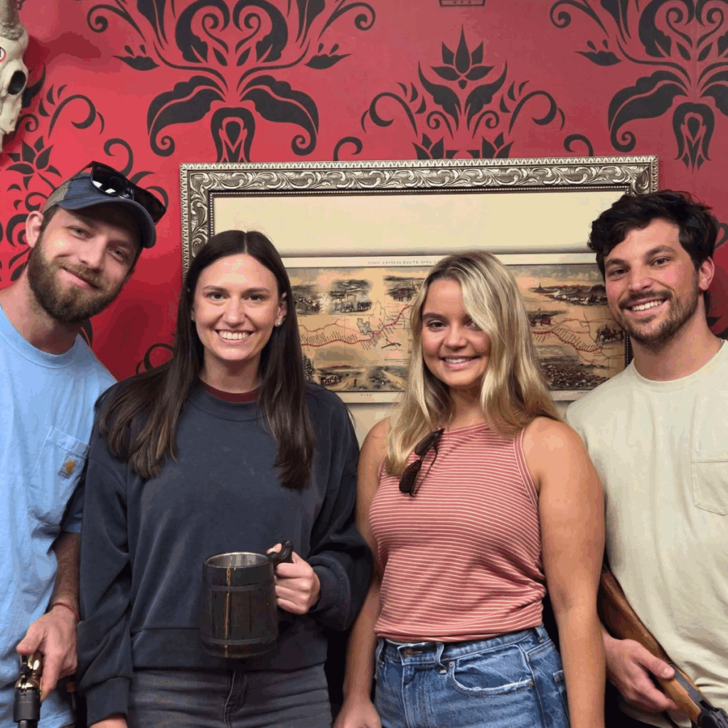 Two young couples enjoying a fun date night at Surelocked In Escape Room in Frederick MD