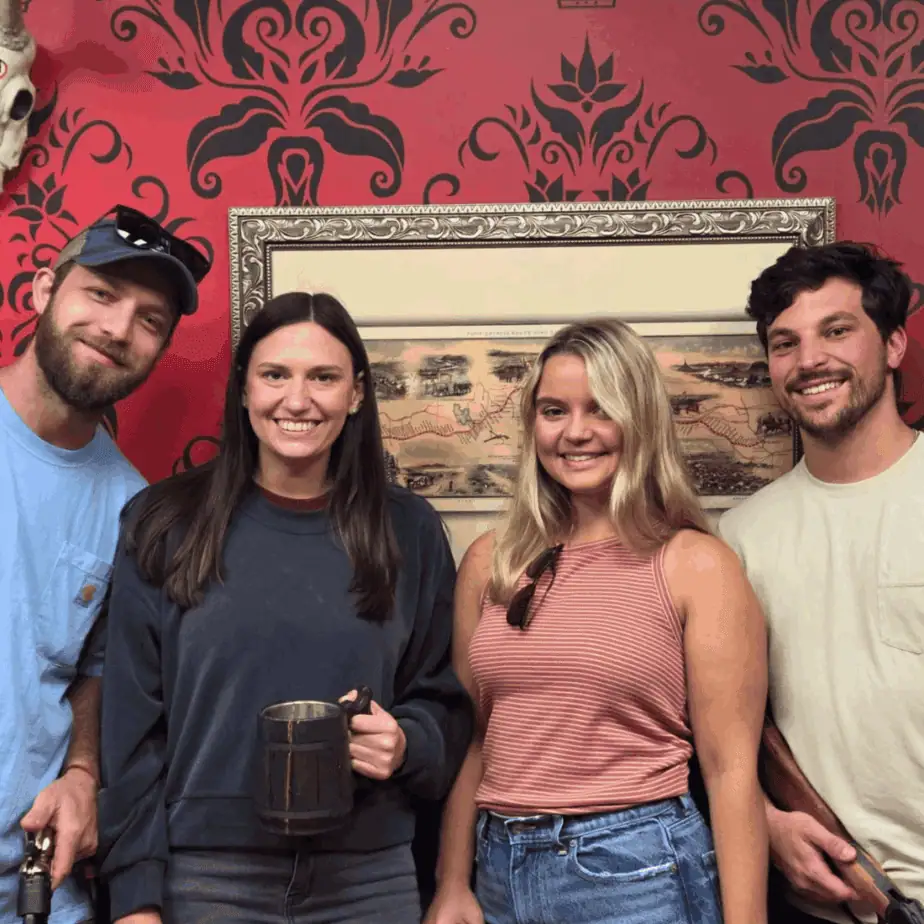 Couples participating in an escape room date night in Frederick MD