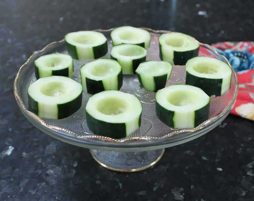 Arrange cucumber cups onto a serving tray