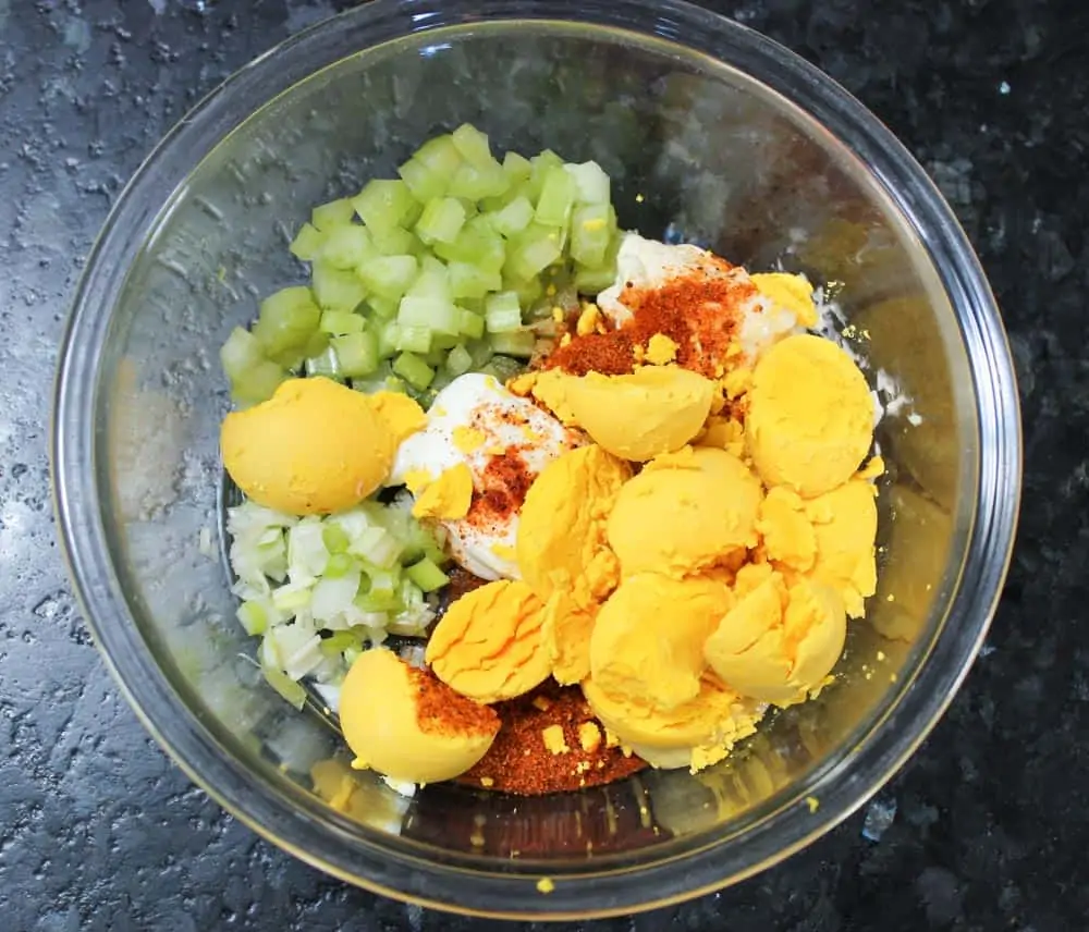 Add Crab Deviled Eggs Ingredients to a large bowl