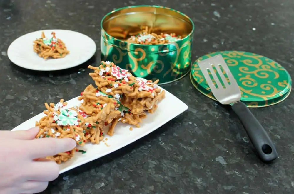 Hand grabbing No Bake Chow Mein Noodle Cookie