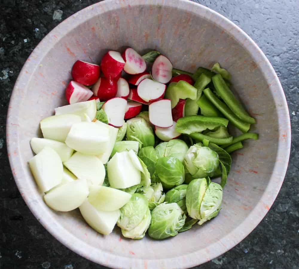 Cut vegetables and place in large bowl