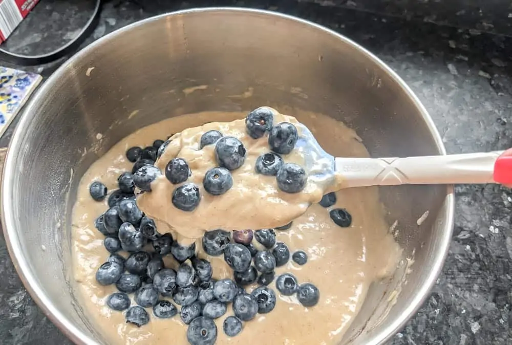 Gently fold in blueberries