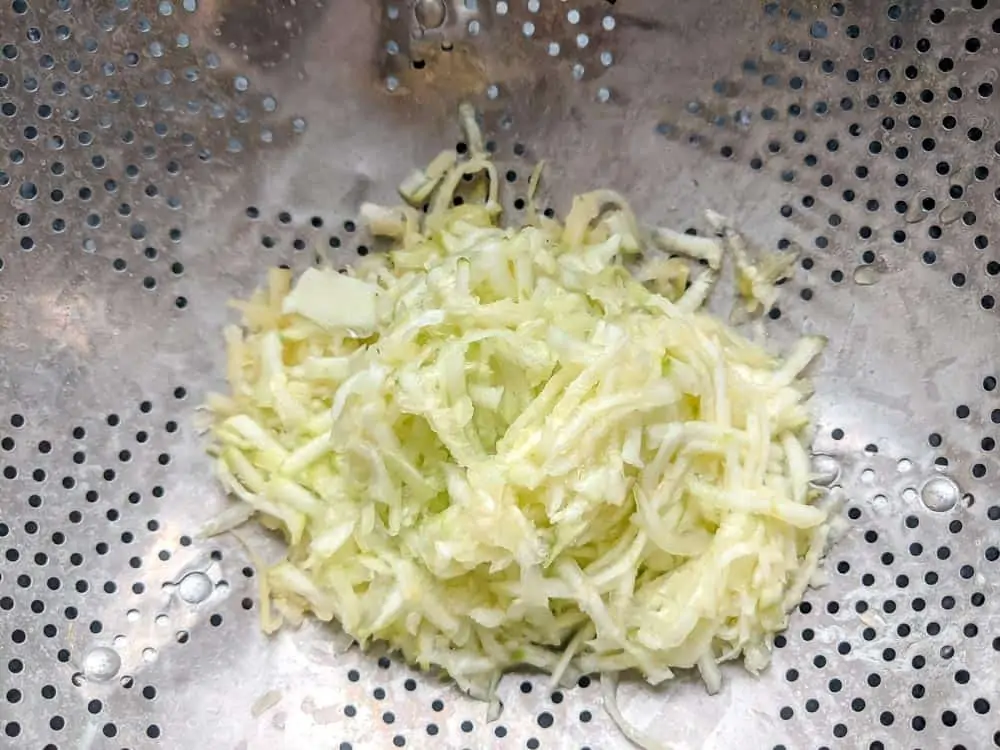 Shred & drain using a colander