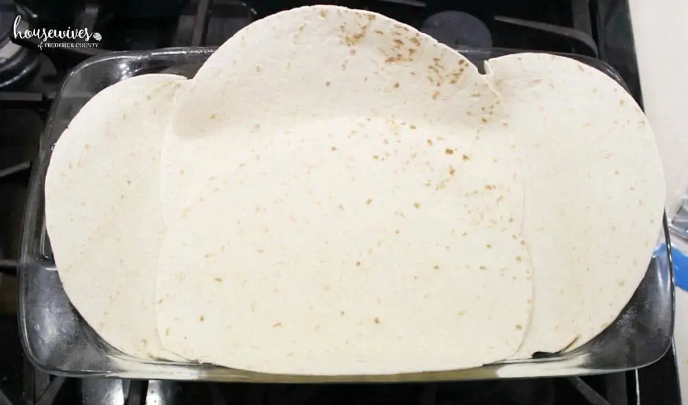 Layer tortillas in bottom of baking dish
