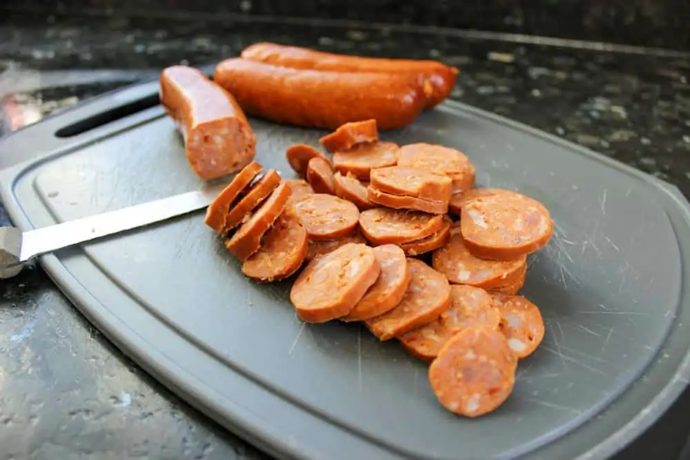 Slice andouille sausage