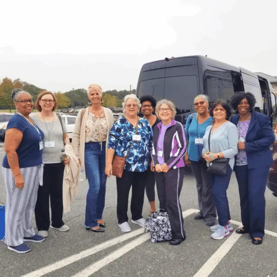 Aging parents and adult children preparing for a trip through Institute for Learning in Retirement