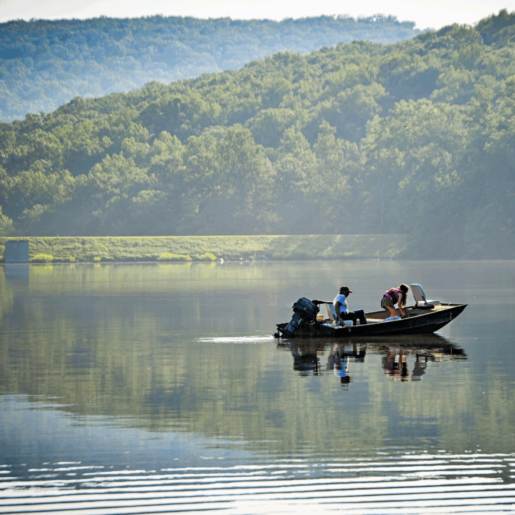 Cunningham Falls State Park father & daughter boating and fishing in Hunting Creek Lake