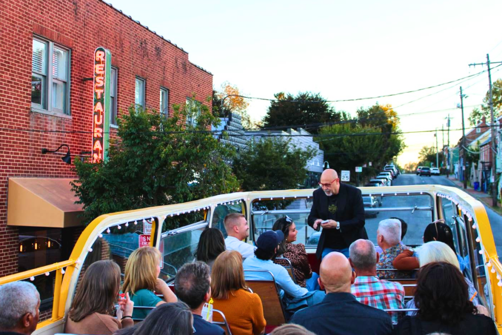 Vintage double-decker bus used for the Magic & Mixers cocktail experience in Downtown Frederick.