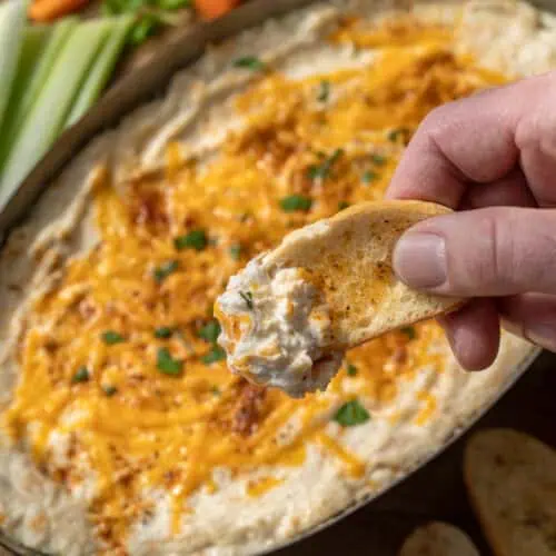 Toasted baguette slice topped with creamy Maryland hot crab dip