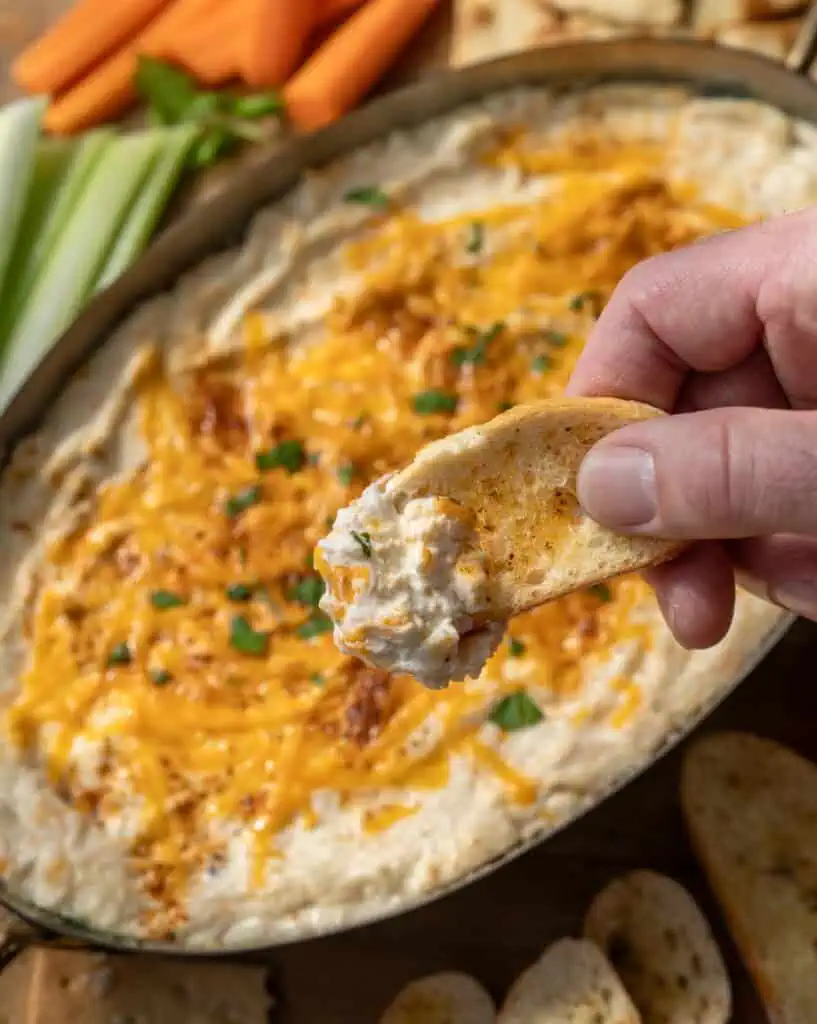 Toasted baguette slice topped with creamy Maryland hot crab dip